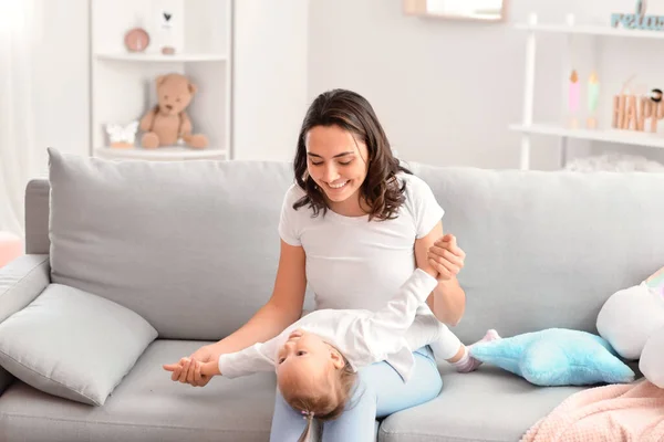 Happy Woman Her Little Daughter Playing Sofa Home — Stock Photo, Image