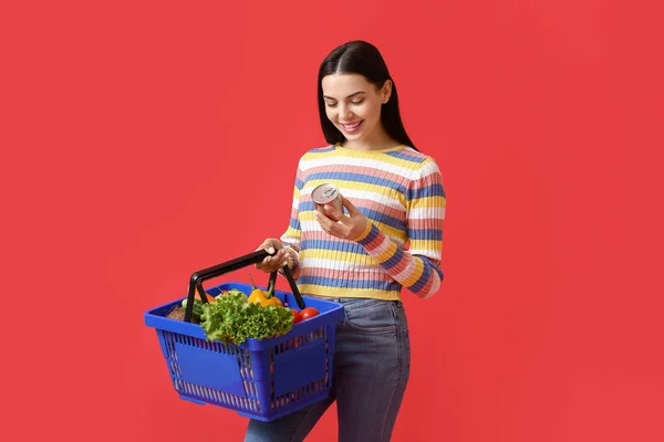 Young Woman Shopping Basket Color Background — Stock Photo, Image