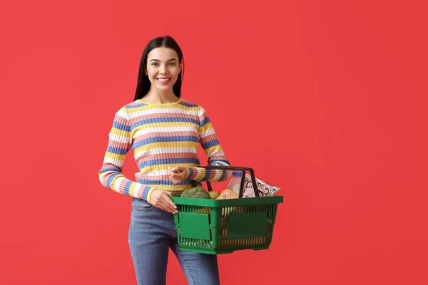 Young Woman Shopping Basket Color Background — Stock Photo, Image