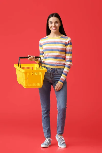 Young Woman Shopping Basket Color Background — Stock Photo, Image