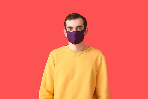 Young Man Wearing Medical Mask Color Background — Stock Photo, Image