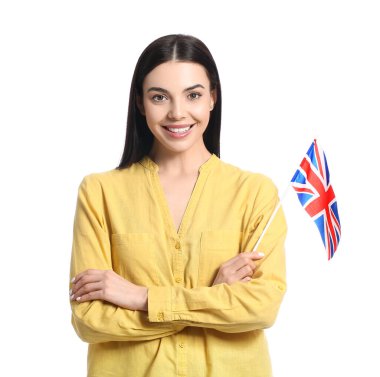 Beautiful young woman with the flag of Great Britain on white background