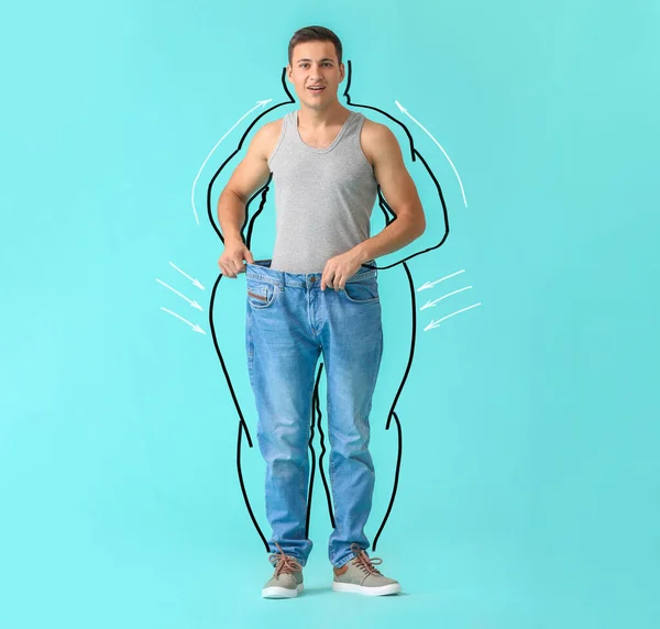 Surprised Young Man Weight Loss Color Background — Stockfoto