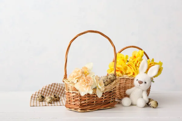 Beautiful Easter Composition Narcissus Flowers Quail Eggs Toy Light Background — Stok fotoğraf