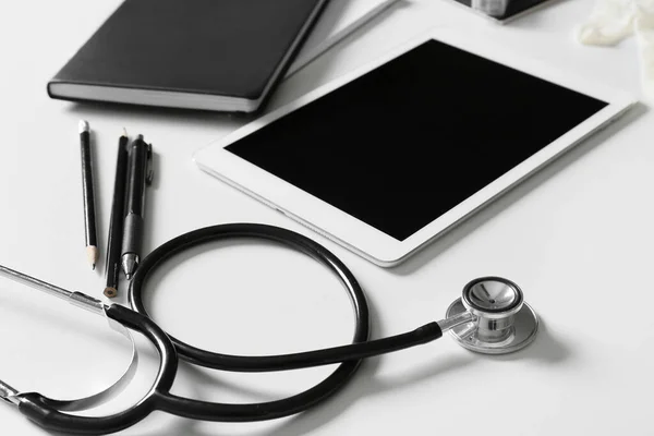 Composition Modern Stethoscope Tablet Computer Light Background Closeup — Stock Photo, Image