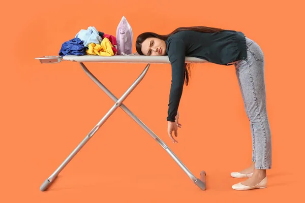 Tired Young Woman Iron Clothes Color Background — Stock fotografie