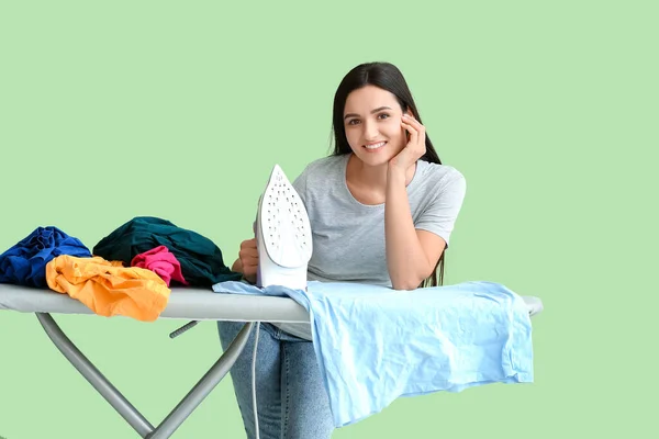 Young Woman Iron Clothes Color Background — Stock Photo, Image