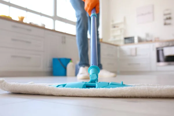 Young Man Mopping Floor Kitchen Closeup — Stok fotoğraf