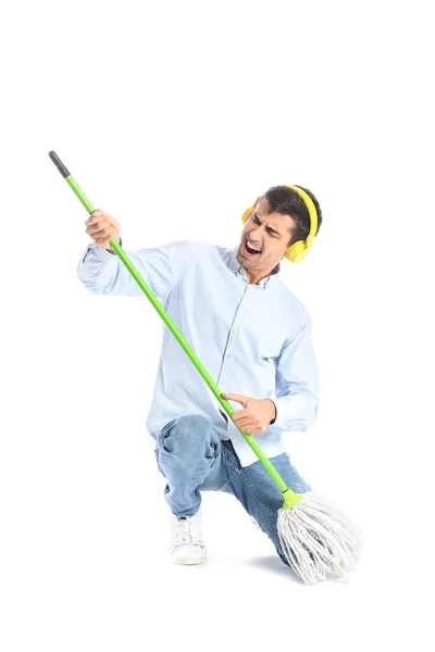 Young Man Headphones Floor Mop White Background — Stock Photo, Image