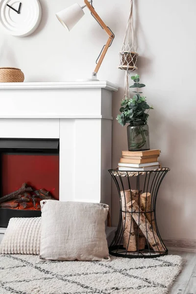 Table Firewood Fireplace Light Wall — Stock Photo, Image