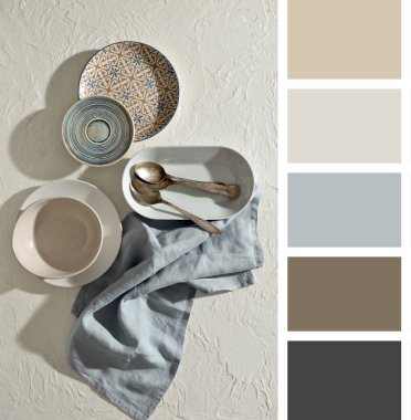 Stylish tableware on white background. Different color patterns