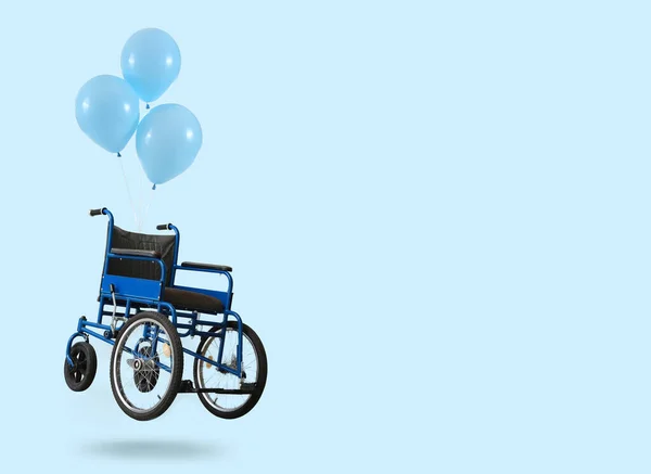 Flying Wheelchair Air Balloons Color Background — Stockfoto