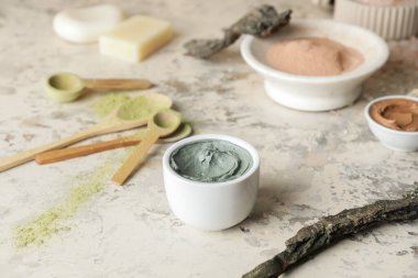 Composition with cosmetic clay on grunge background