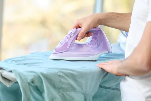 Handsome Young Man Ironing Clothes Home Closeup — Foto Stock