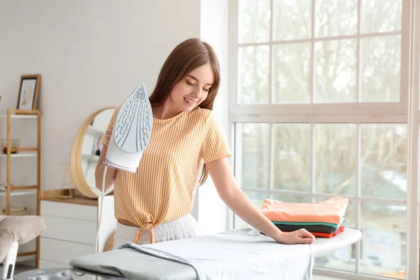 Young Woman Ironing Laundry Home — Stock Photo, Image