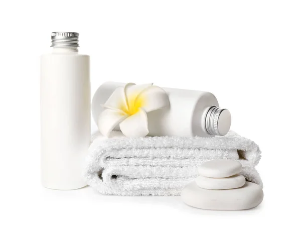 Bottles Cosmetic Products Towels Spa Stones White Background — Zdjęcie stockowe