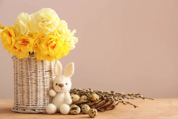 Beautiful Easter Composition Narcissus Flowers Quail Eggs Toy Color Background — Stok fotoğraf