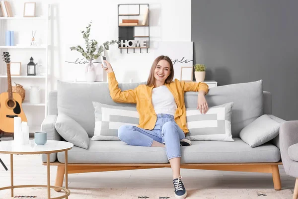 Beautiful Young Woman Air Conditioner Remote Control Living Room — Stock Photo, Image