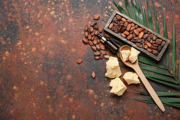 Cocoa Butter Bottle Essential Oil Beans Grunge Background — Stock Photo, Image