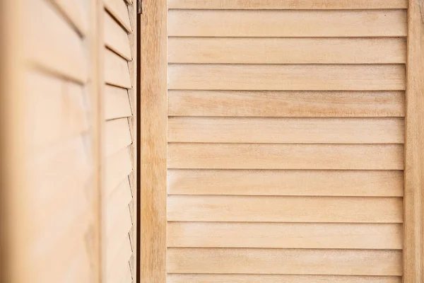 Closeup view of wooden folding screen