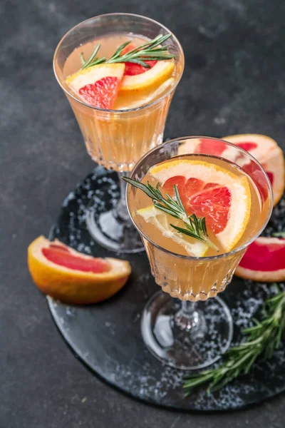 Glasses Tasty Grapefruit Cocktail Rosemary Dark Background — Stock Photo, Image