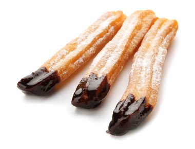 Tasty churros dipped in chocolate on white background clipart