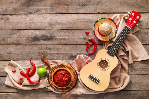 Sammansättning Med Välsmakande Chili Sås Ingredienser Sombrero Hatt Och Ukulele — Stockfoto