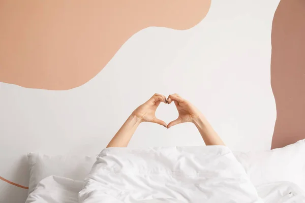 Young Woman Making Heart Her Hands Bedroom — Stock Photo, Image