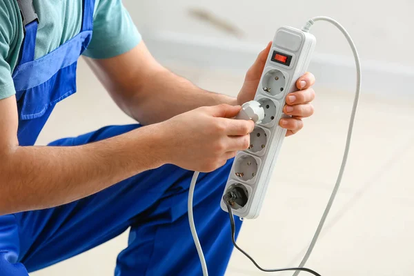 Young Electrician Extension Cord Room Closeup — Stock Photo, Image