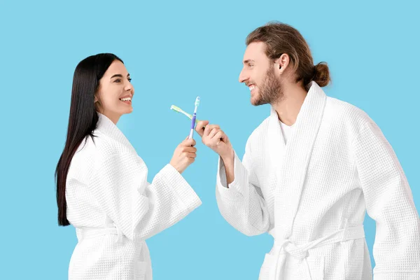 Young Couple Tooth Brushes Color Background — Stock Photo, Image