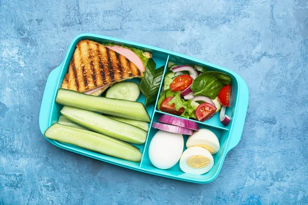 Lunchbox Chutným Jídlem Barevném Pozadí — Stock fotografie