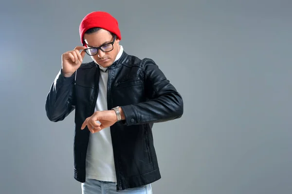 Fashionable Young Man Looking His Watch Grey Background — Stock Photo, Image