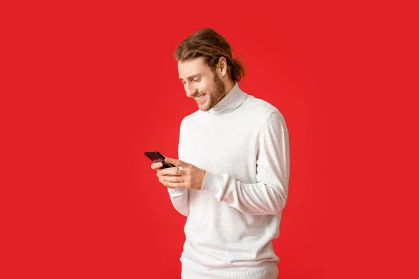 Young Man Using Mobile Phone Color Background — Stock Photo, Image