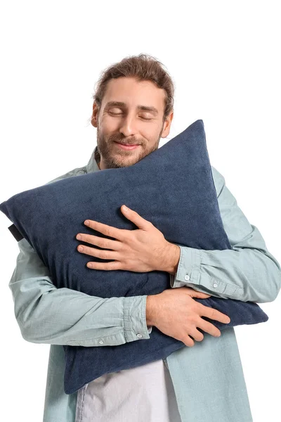 Giovane Uomo Abbracciare Cuscino Sfondo Bianco — Foto Stock