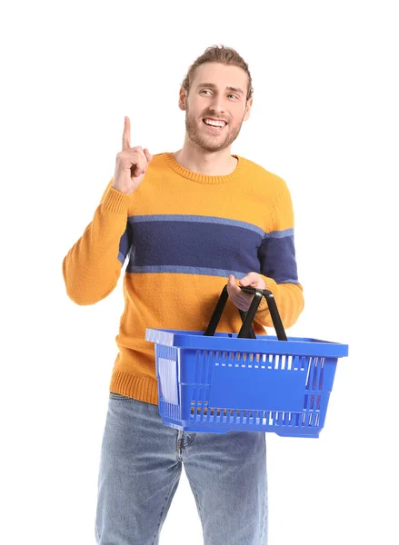Boş Alışveriş Sepeti Beyaz Arka Planda Işaret Parmağı Olan Genç — Stok fotoğraf