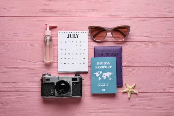 Calendar Travel Accessories Immune Passport Color Wooden Background — Stock Photo, Image