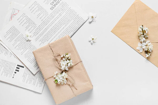 Beautiful Blooming Branches Gift Box Newspaper Light Background — Stock Photo, Image