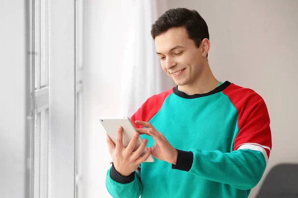 Handsome Young Man Using Tablet Computer Home — Stock Photo, Image