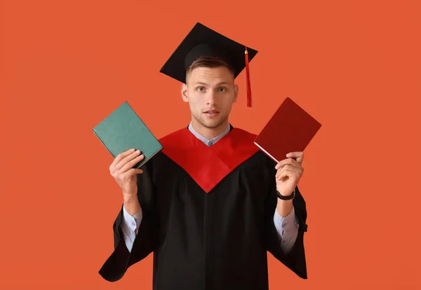 Male Graduating Student Books Color Background — Stock Photo, Image