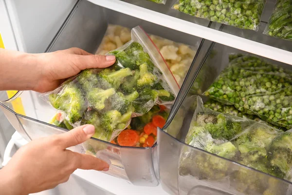 Woman Putting Plastic Bag Vegetables Refrigerator — Stock Photo, Image