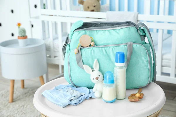 Bottles Milk Baby Bag Table Room — Stock Photo, Image