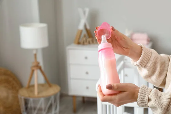 Woman Bottle Milk Baby Room — Stock Photo, Image