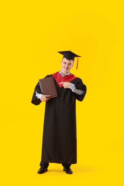 Male Graduating Student Book Color Background — Stock Photo, Image