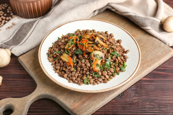 Plate Tasty Cooked Lentils Mushrooms Table — Stock Photo, Image