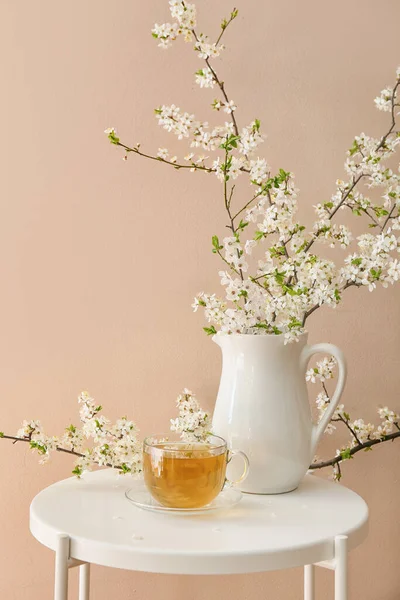 Cup Tasty Tea Jug Blooming Branches Table Color Wall — Stock Photo, Image