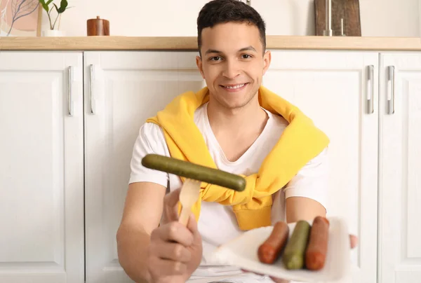 Young Man Tasty Sausages Kitchen — Stock Photo, Image