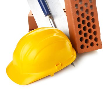 Beyaz arka planda inşaatçı malzemeleri seti