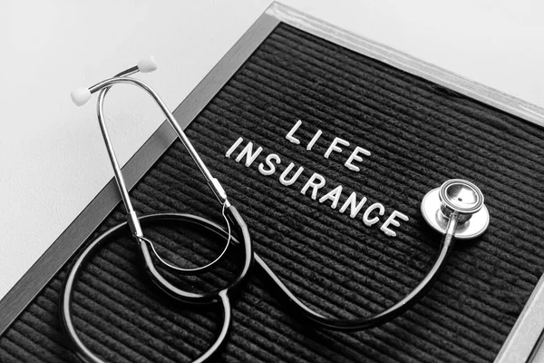 Board Stethoscope Text Life Insurance Light Background — Stock Photo, Image