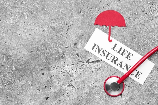 Text Life Insurance Umbrella Stethoscope Grunge Background — Stock Photo, Image