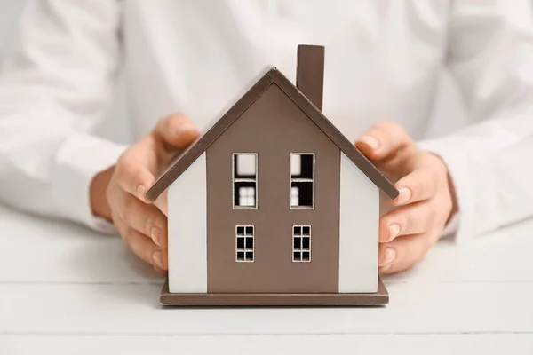 Woman House Model White Wooden Background Property Insurance Concept — Stock Photo, Image